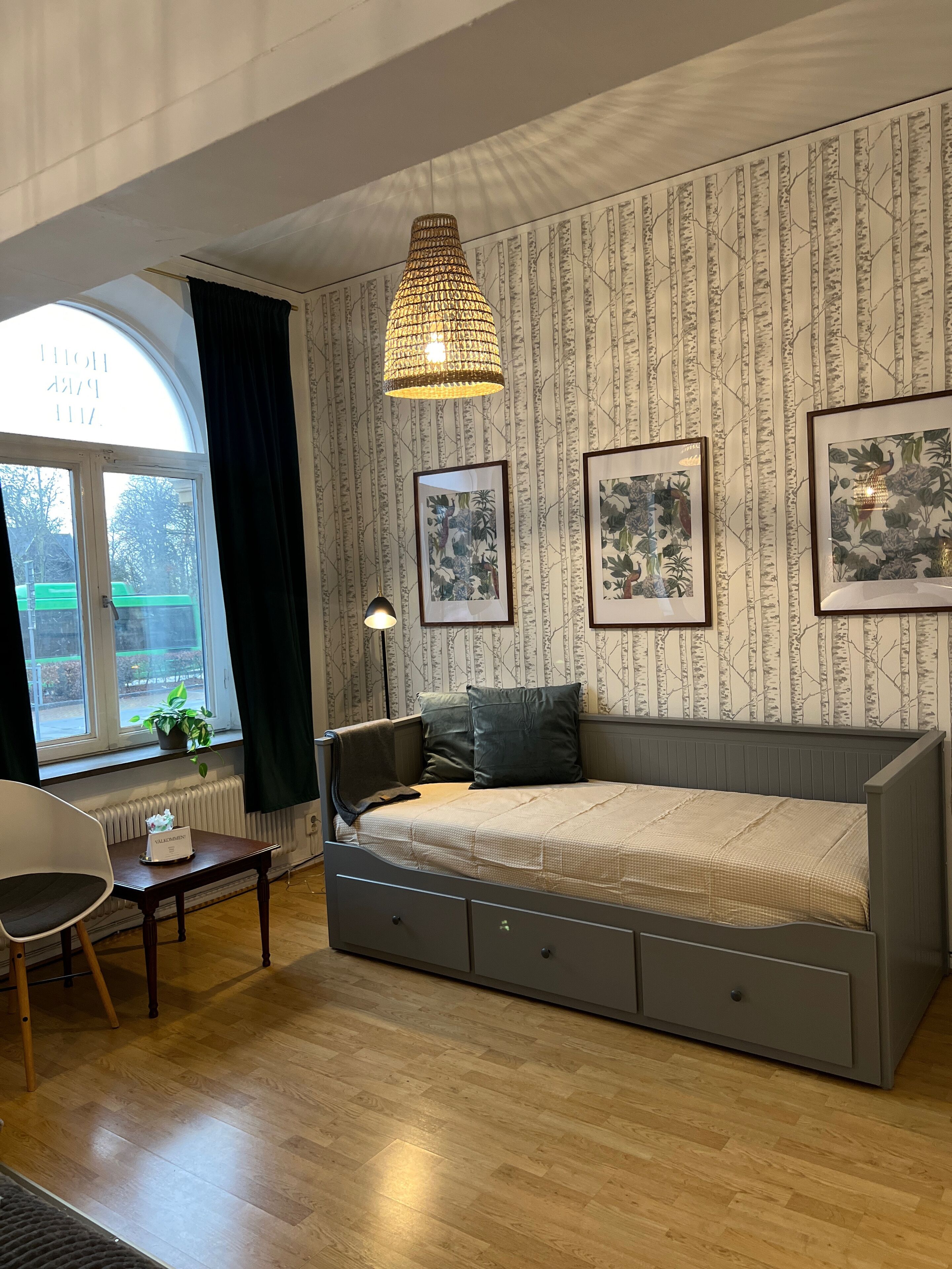 family room | 1 bedroom, premium bedding, individually furnished, desk