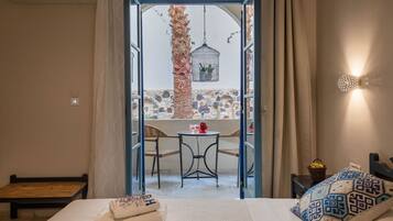 Economy Double Room, Courtyard View | 1 bedroom, in-room safe, individually decorated, individually furnished