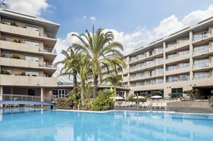 Indoor pool, outdoor pool, pool umbrellas, sun loungers