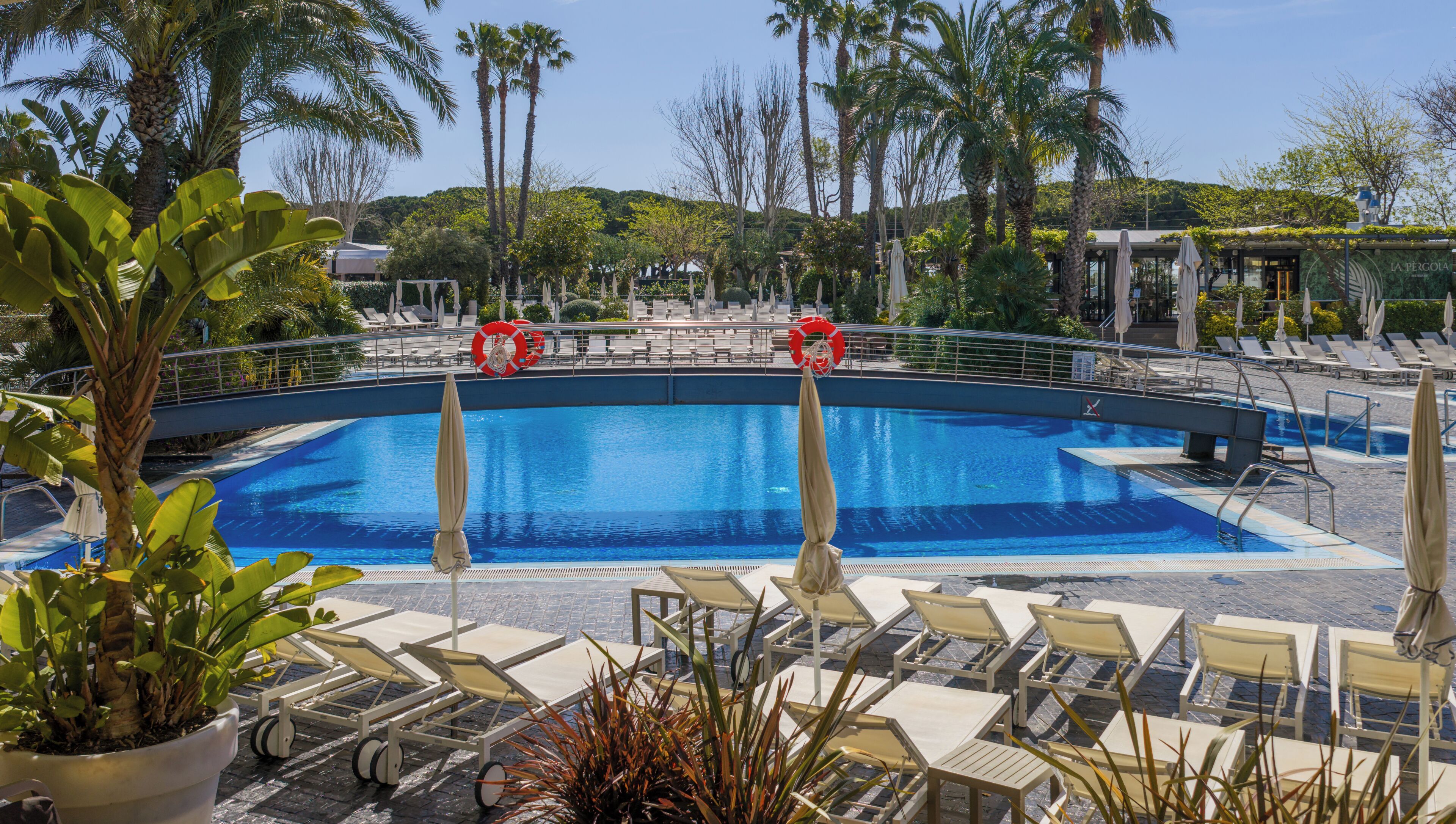 Indoor pool, outdoor pool, pool umbrellas, sun loungers