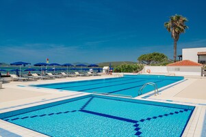 Seasonal outdoor pool, pool umbrellas, sun loungers