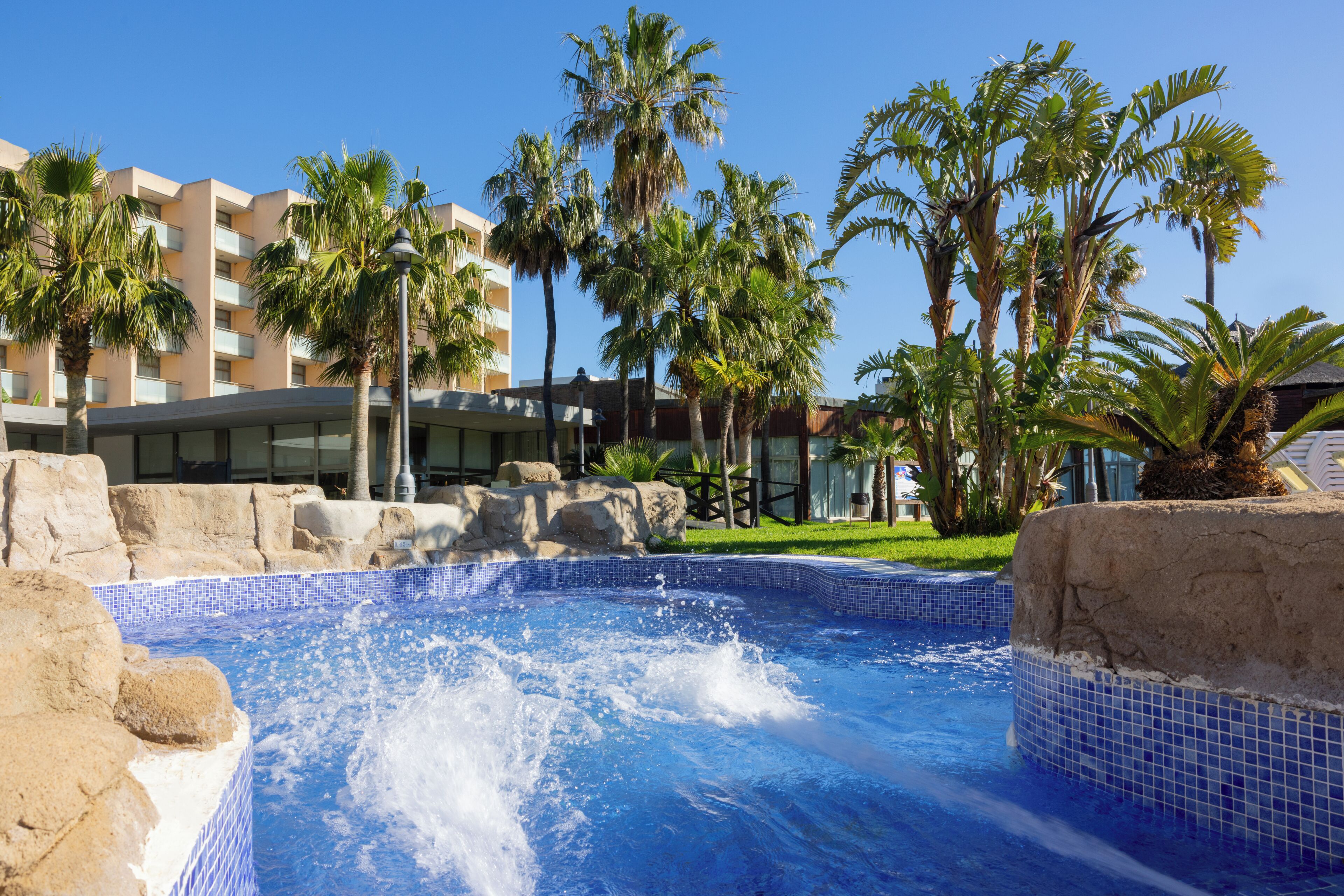 Indoor pool, outdoor pool, pool umbrellas, pool loungers
