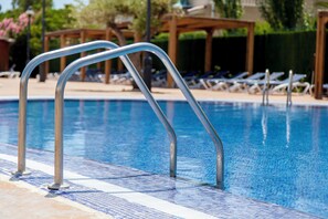 Indoor pool, outdoor pool, pool umbrellas, sun loungers