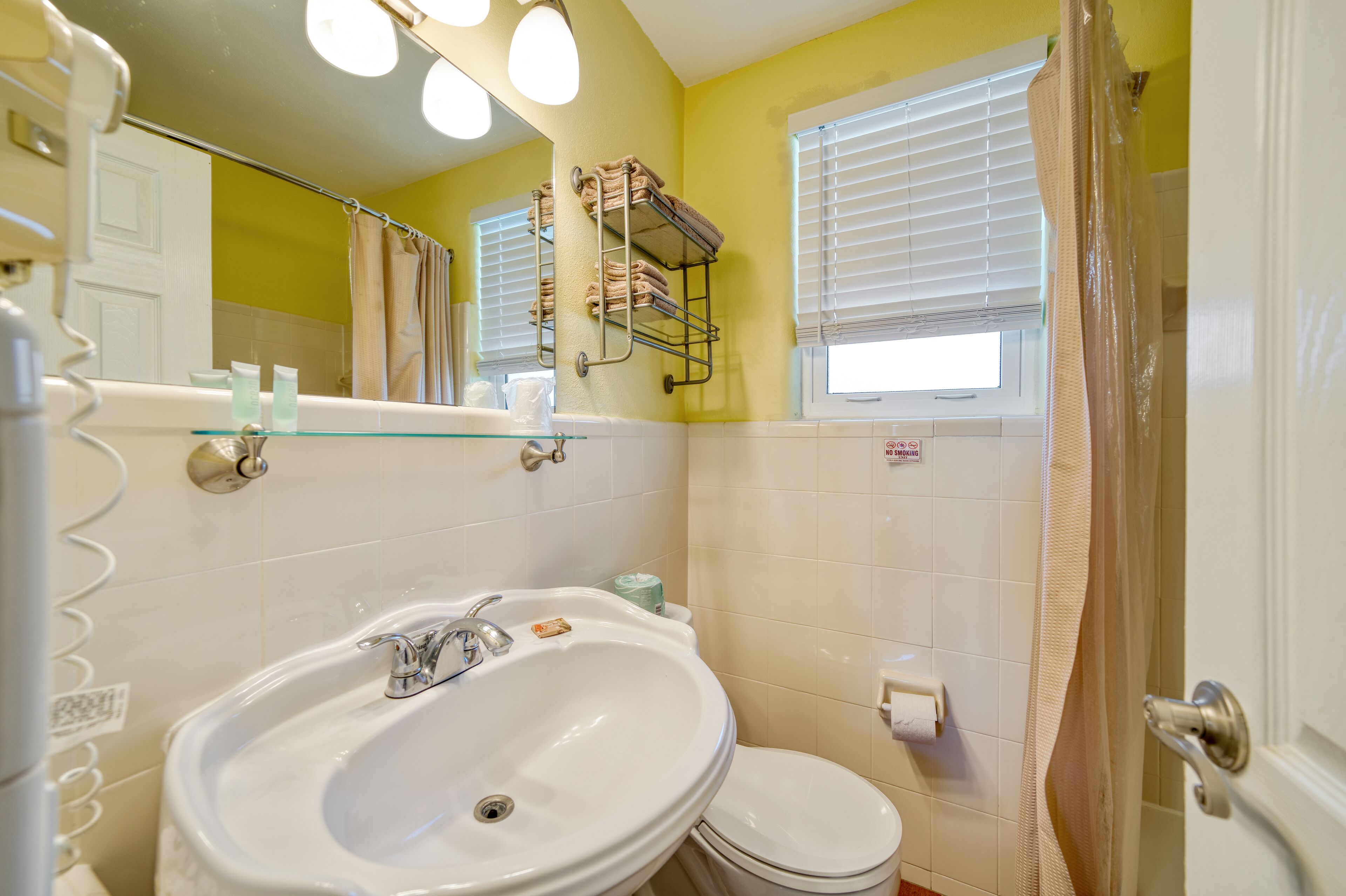 room, 1 queen bed | bathroom | free toiletries, towels