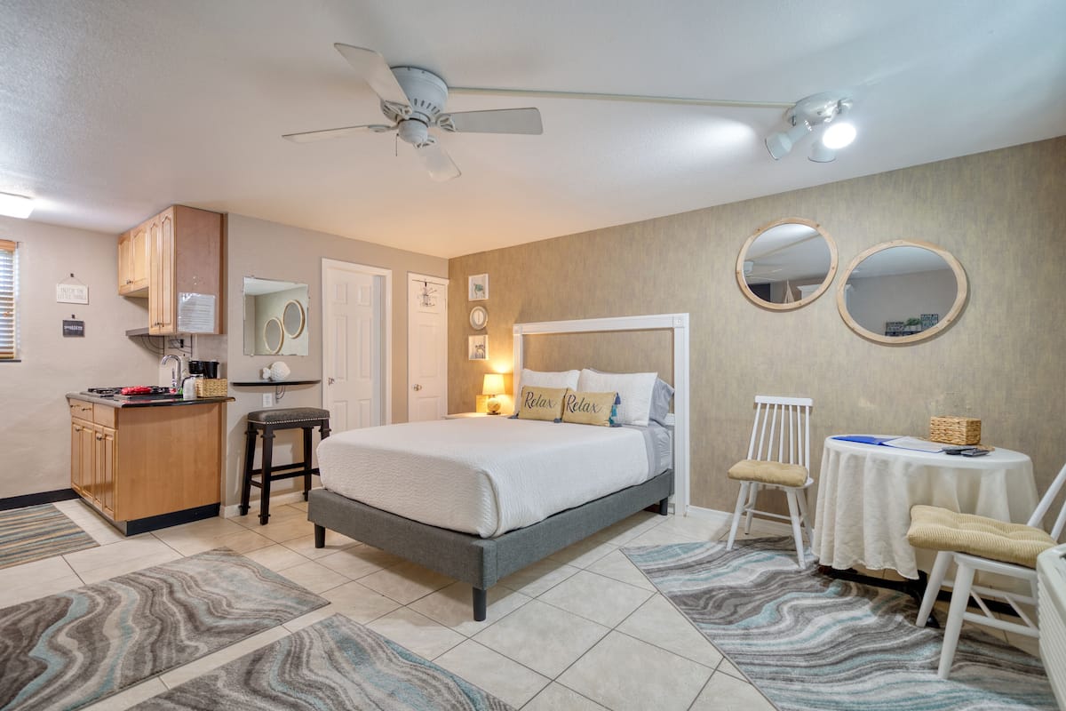 Room, 1 Queen Bed | 1 bedroom, individually decorated, individually furnished