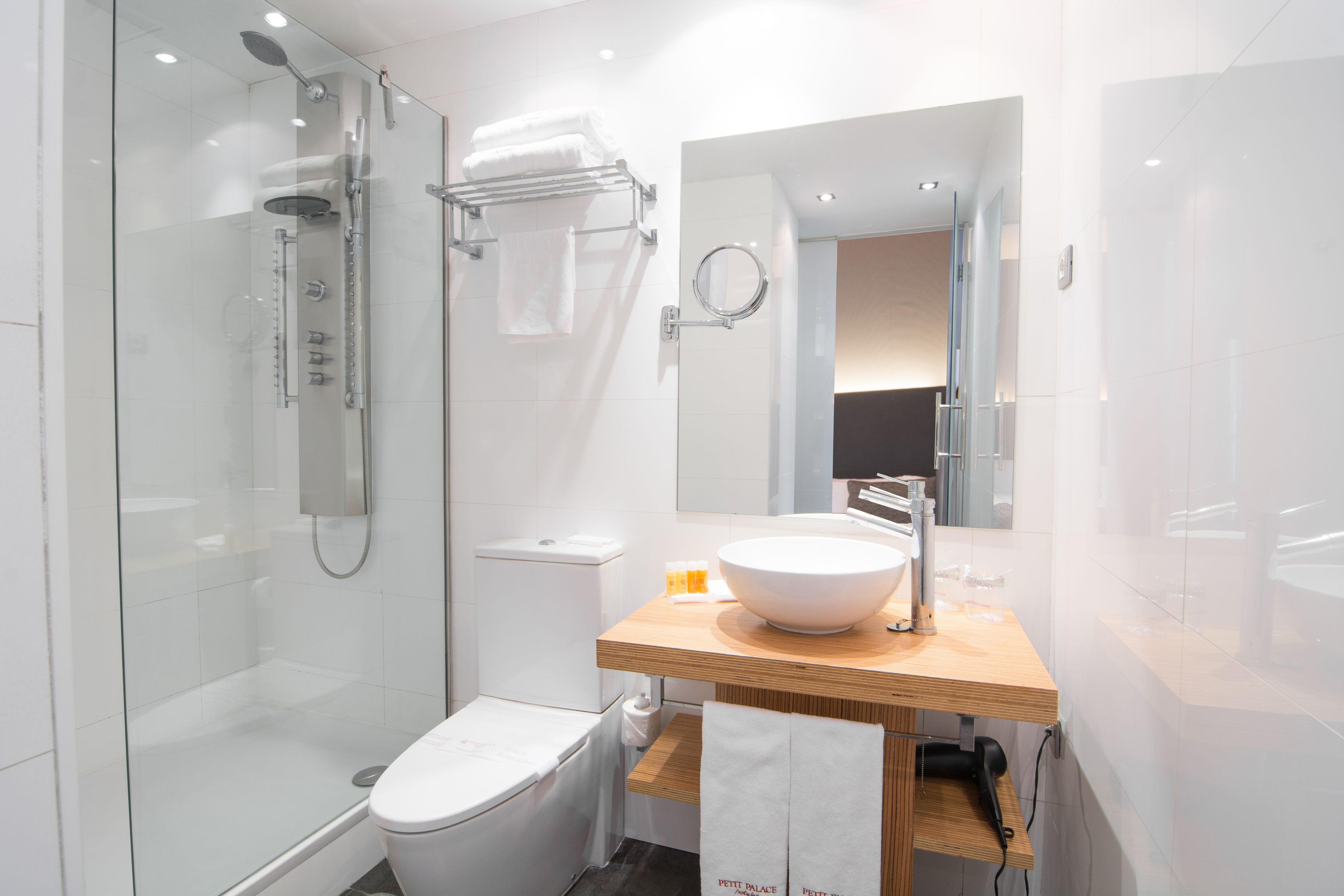 shower, free toiletries, hair dryer, towels