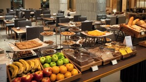A buffet with various food items including fruits, pastries, and desserts. - Hotel Alejandro I, Affiliated by Meliá (Salta)