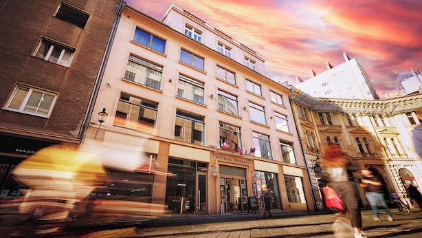 A building with multiple windows and a sign that reads "Central Passage." - Art Hotel William (Bratislava)