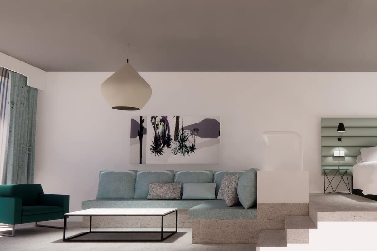 Een moderne slaapkamer met een bed, een bank, een bijzettafeltje en een hanglamp.