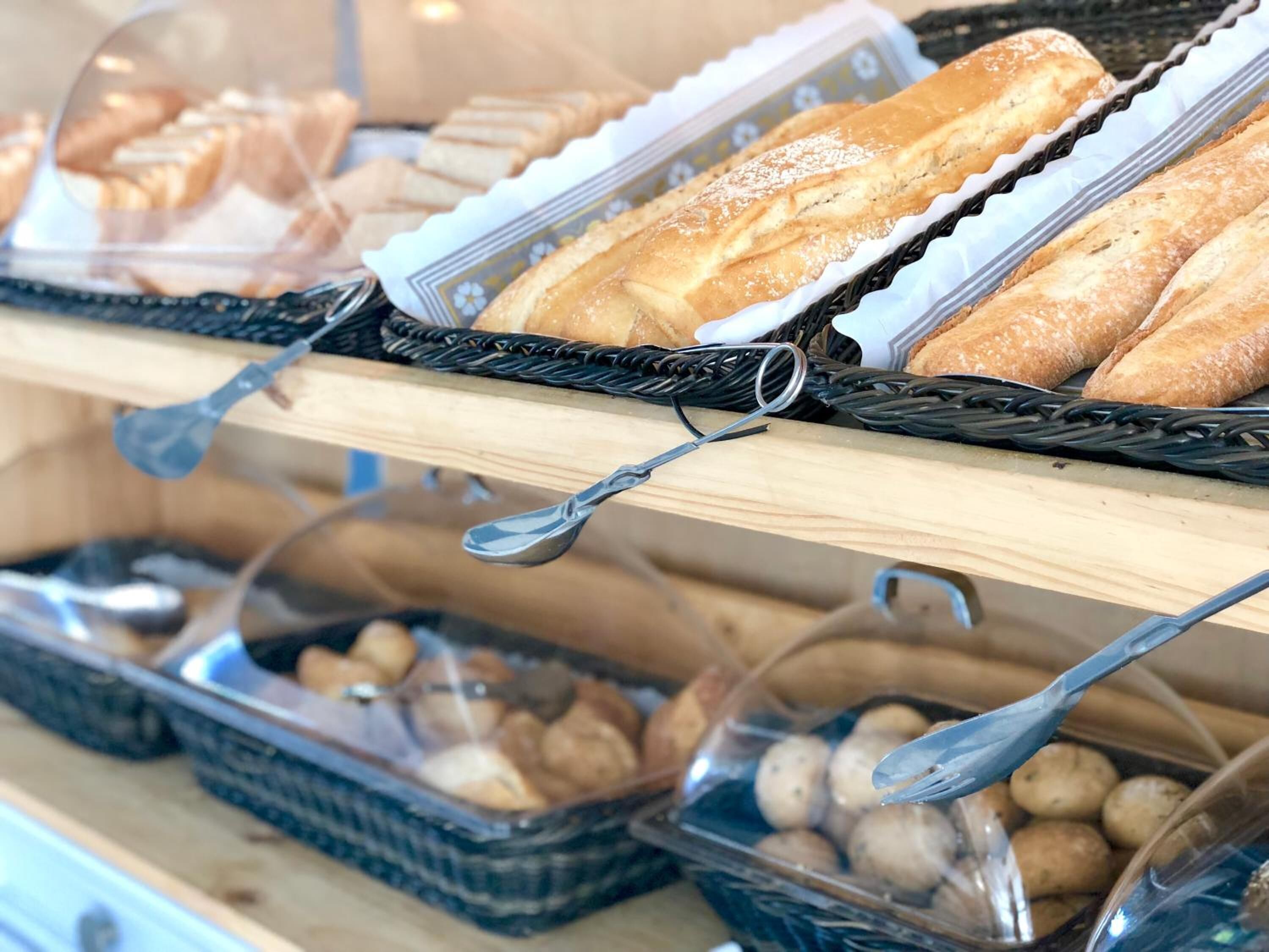 A buffet with bread and potatoes.