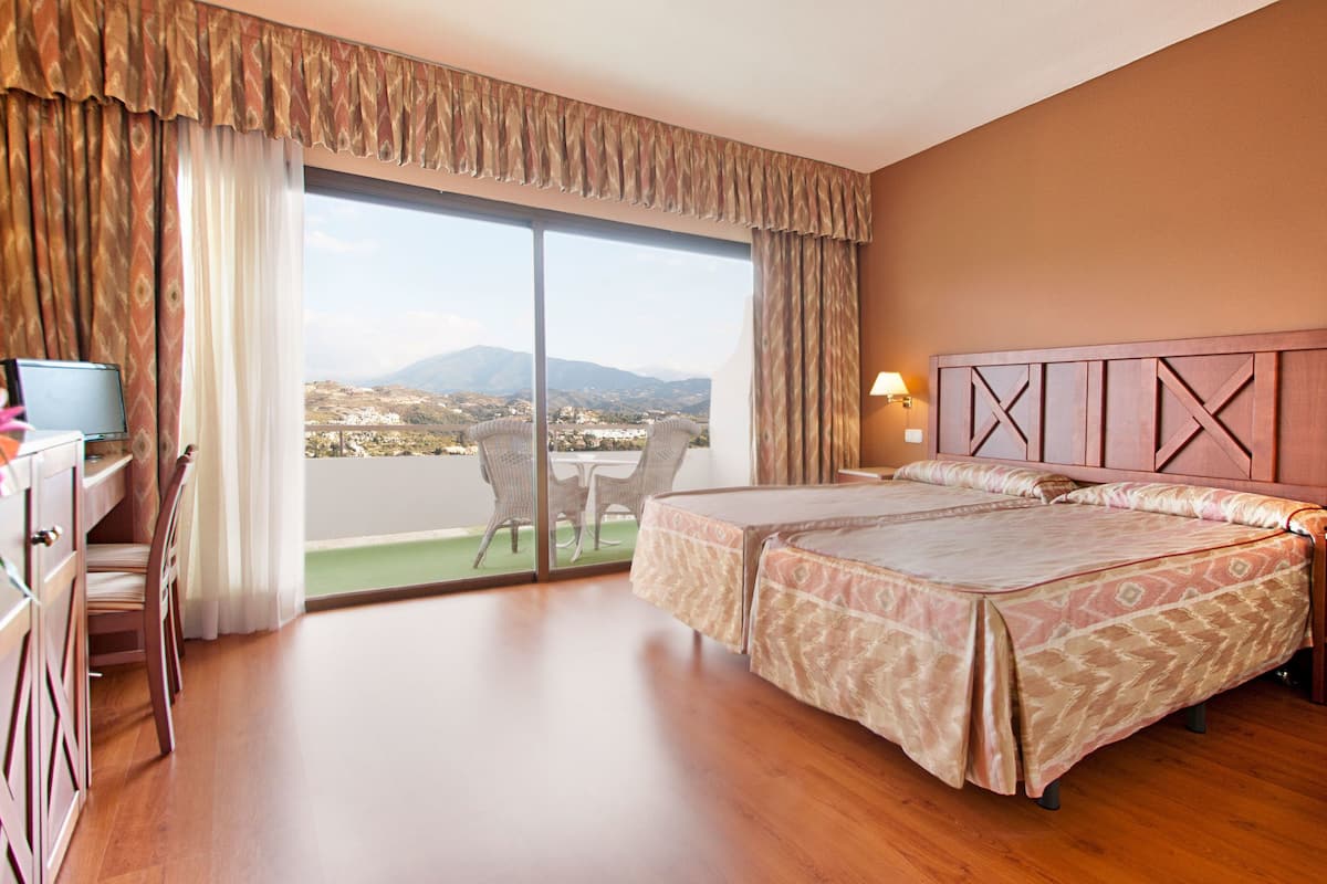 Down comforters, minibar, desk, free WiFi