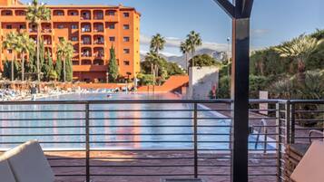 Indoor pool, seasonal outdoor pool, pool umbrellas, pool loungers