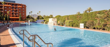 Indoor pool, seasonal outdoor pool, pool umbrellas, sun loungers
