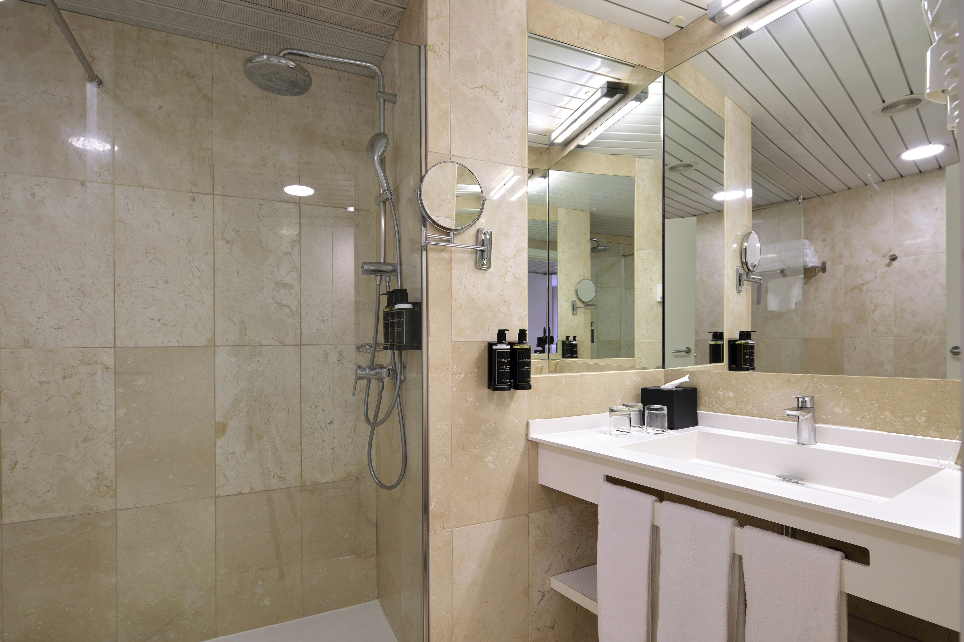 eco-friendly toiletries, hair dryer, towels, soap