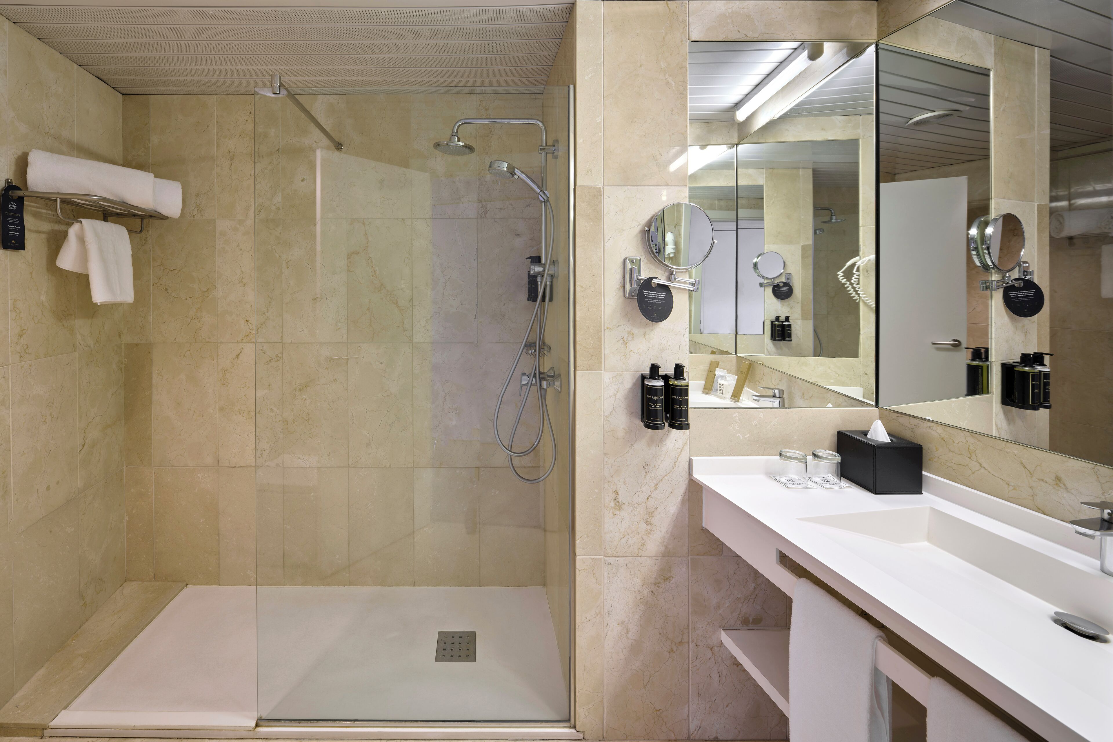 eco-friendly toiletries, hair dryer, towels, soap