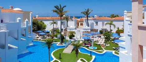 2 outdoor pools, pool umbrellas, pool loungers