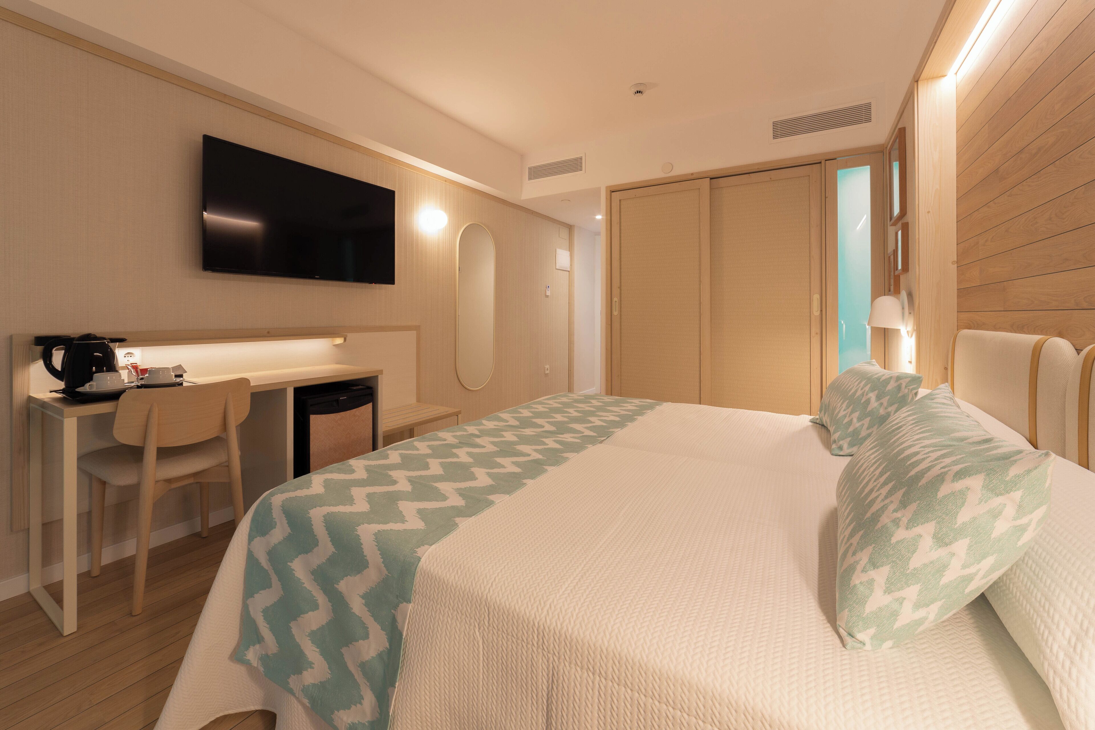 Minibar, desk, blackout drapes, soundproofing