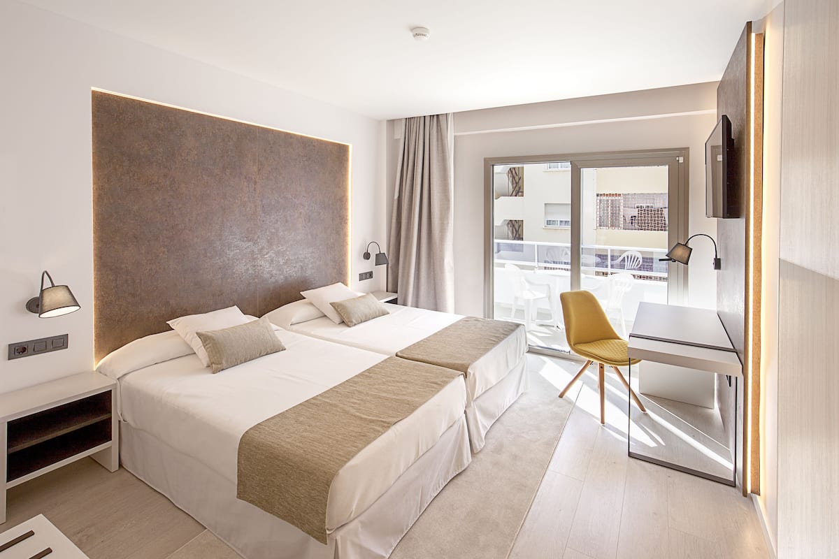 Minibar, desk, blackout drapes, bed sheets