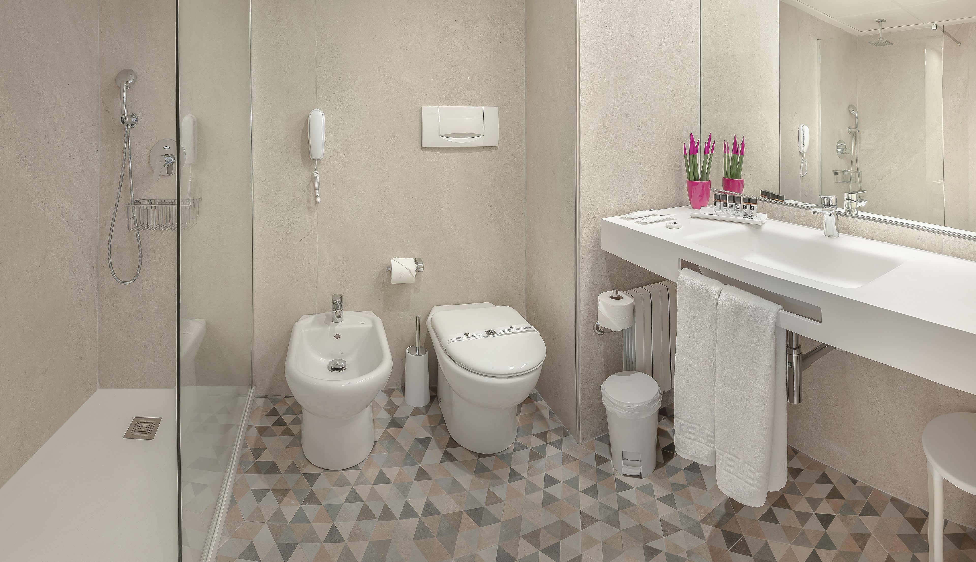 free toiletries, hair dryer, bidet, towels