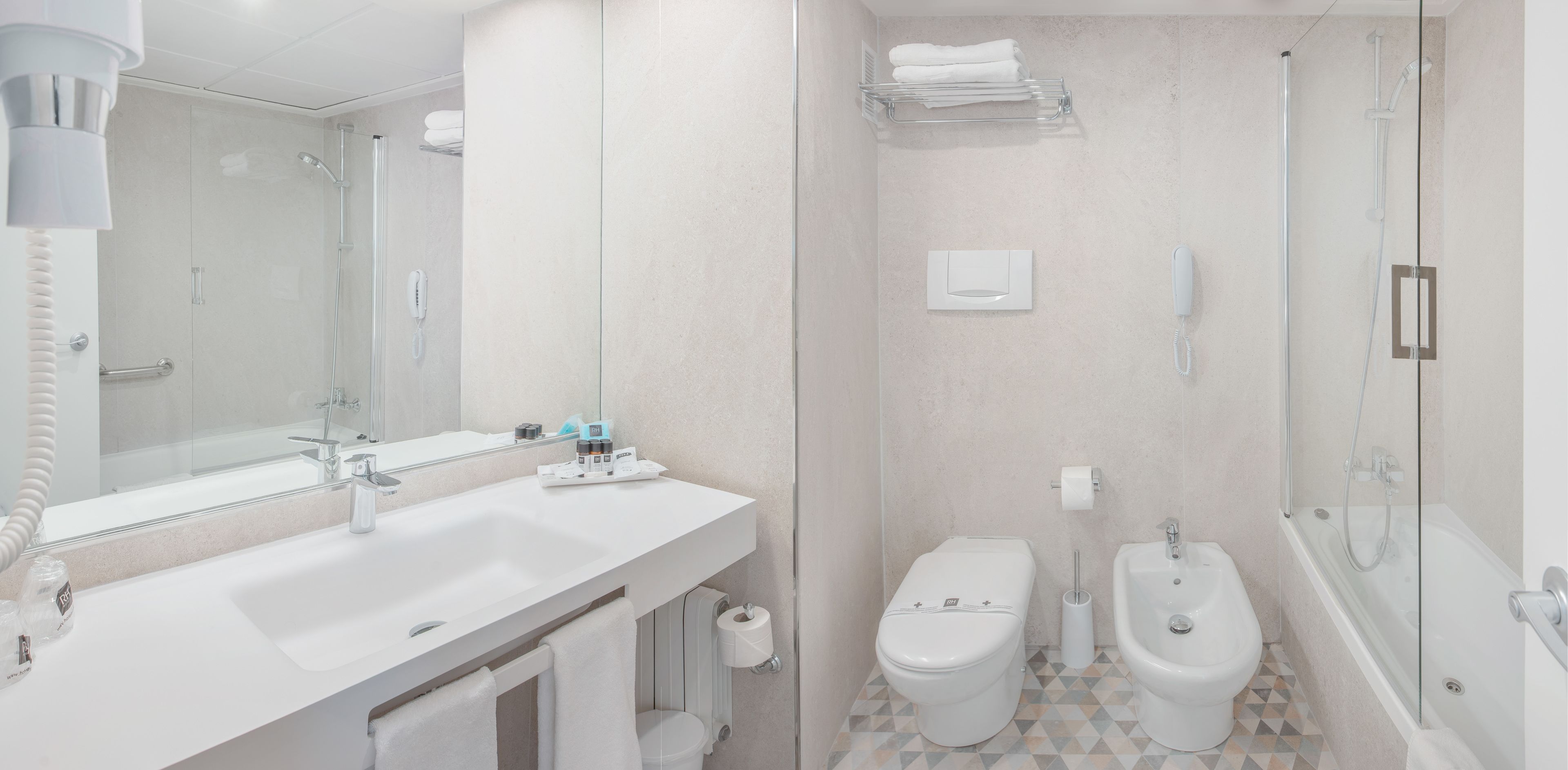 free toiletries, hair dryer, bidet, towels