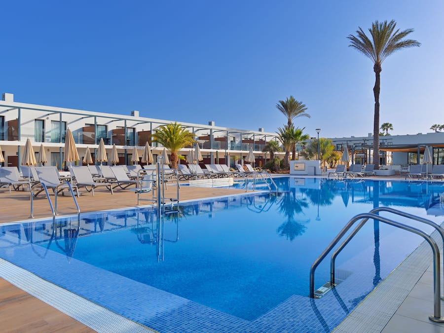 Outdoor pool, pool umbrellas, pool loungers