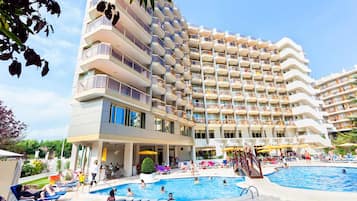 Enjoy a stay with a balcony view, surrounded by multiple pools and sun loungers.