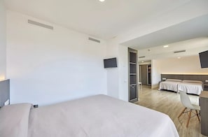 Desk, blackout drapes, soundproofing, iron/ironing board