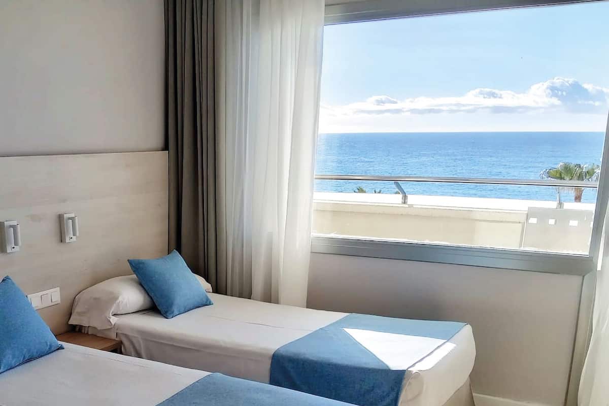 Deluxe Triple Room, Balcony, Sea View | Desk, free WiFi, bed sheets