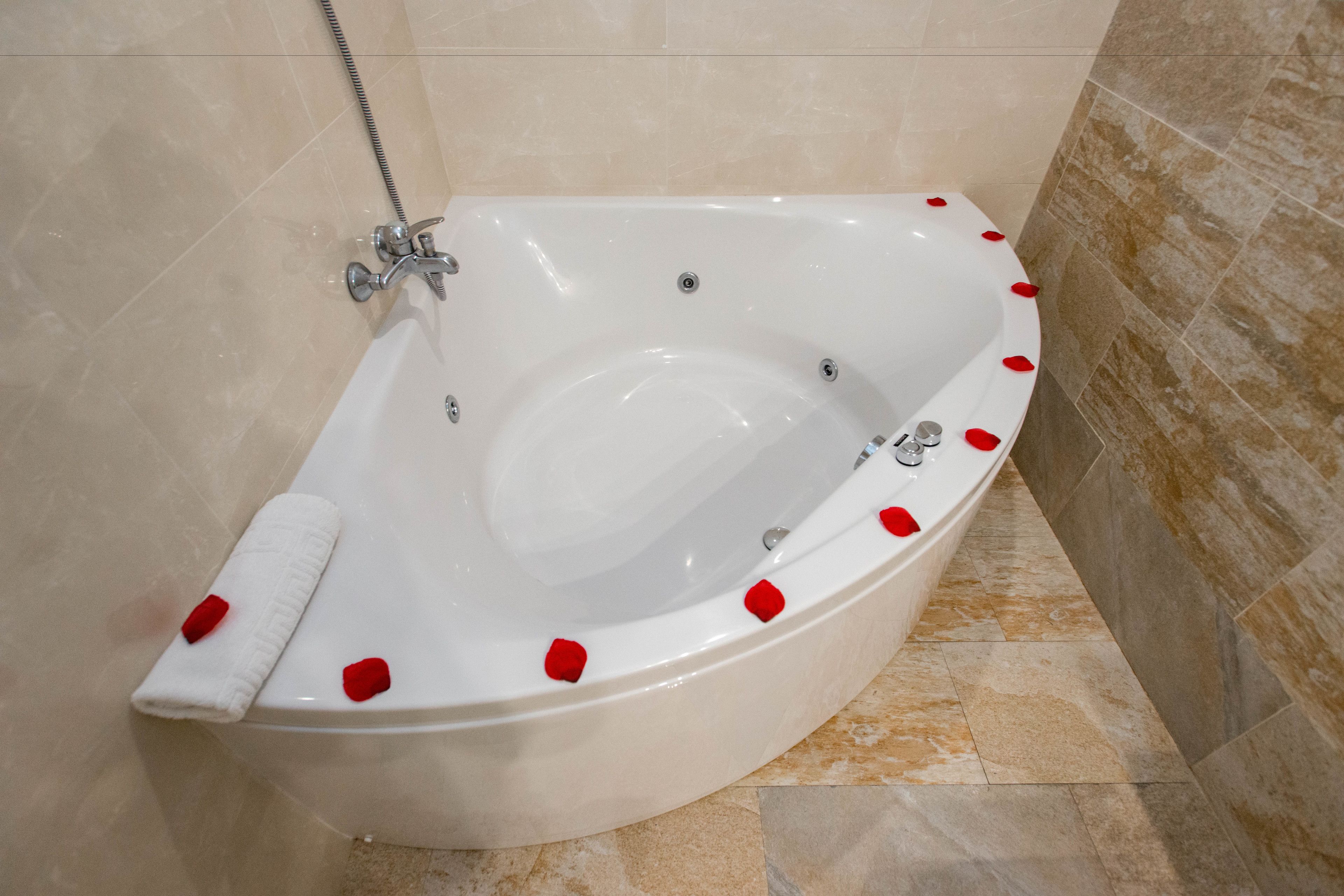 premium room, jetted tub | bathroom | free toiletries, hair dryer, towels