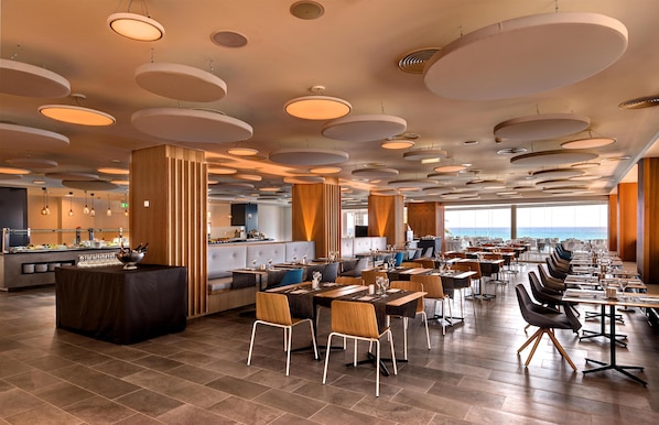 Breakfast, lunch, dinner served; international cuisine