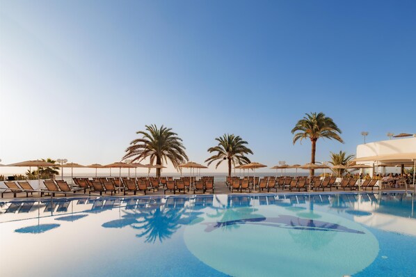 2 outdoor pools, pool umbrellas, pool loungers
