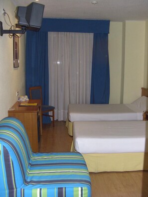 Minibar, desk, iron/ironing board, bed sheets