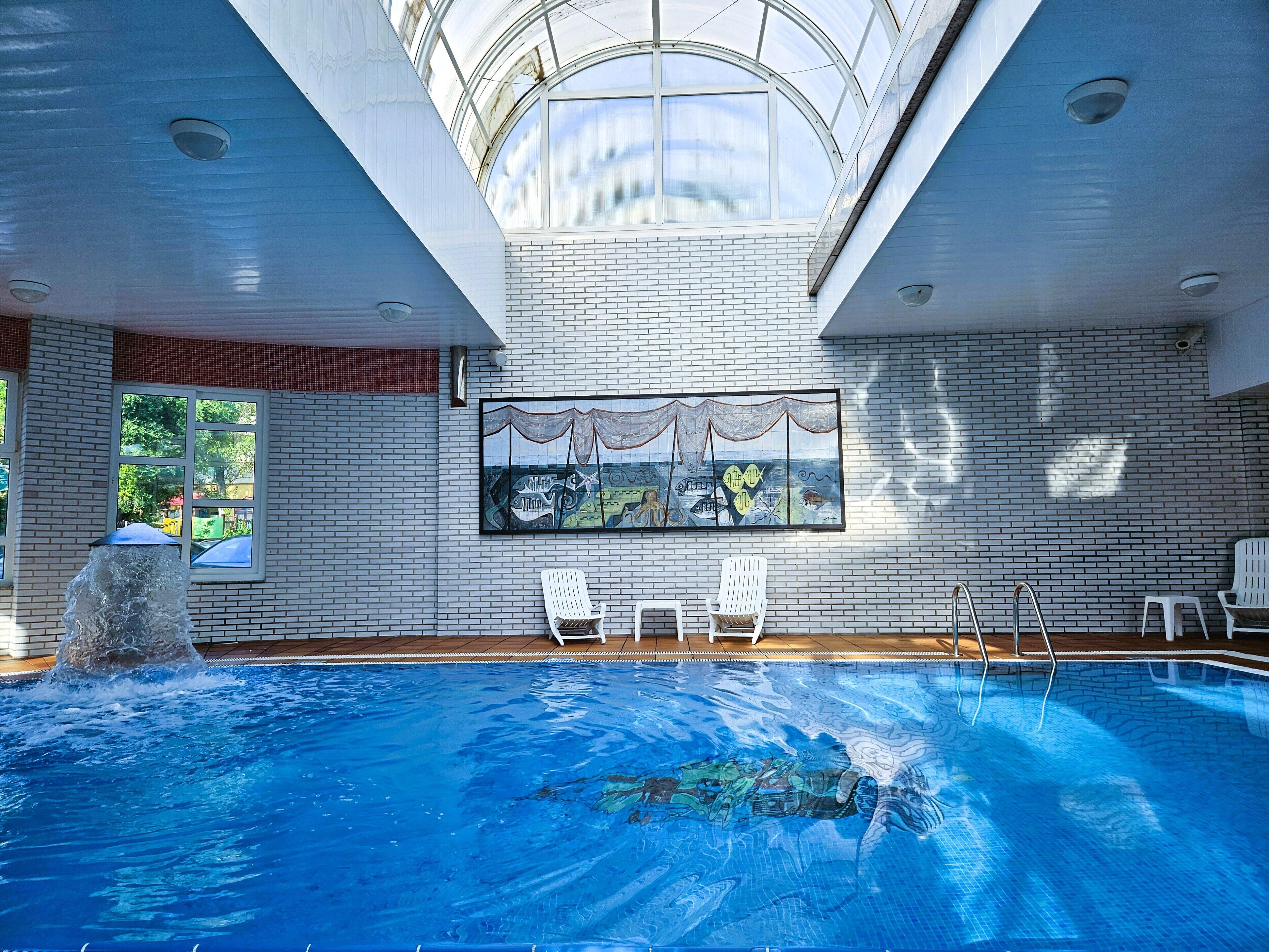 Indoor pool, outdoor pool, open 9:00 AM to 8:00 PM, pool umbrellas