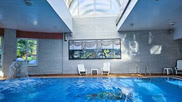 Indoor pool, outdoor pool, open 9:00 AM to 8:00 PM, pool umbrellas