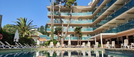 Indoor pool, outdoor pool, open 9:00 AM to 8:00 PM, pool umbrellas