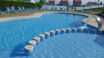 Outdoor pool, open 10:00 AM to 8:00 PM, pool umbrellas, sun loungers