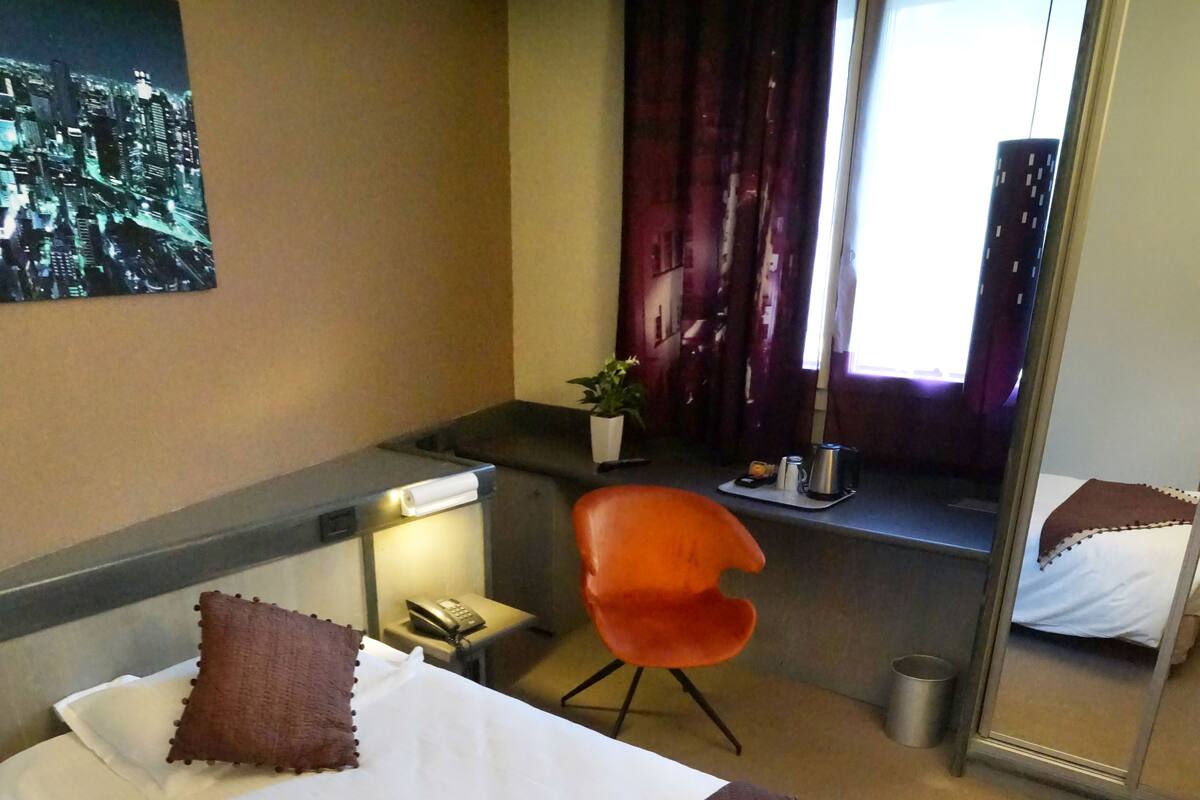 Premium bedding, desk, laptop workspace, soundproofing