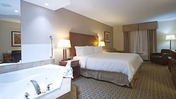 Suite, 1 King Bed, Jetted Tub | In-room safe, desk, iron/ironing board, free cots/infant beds