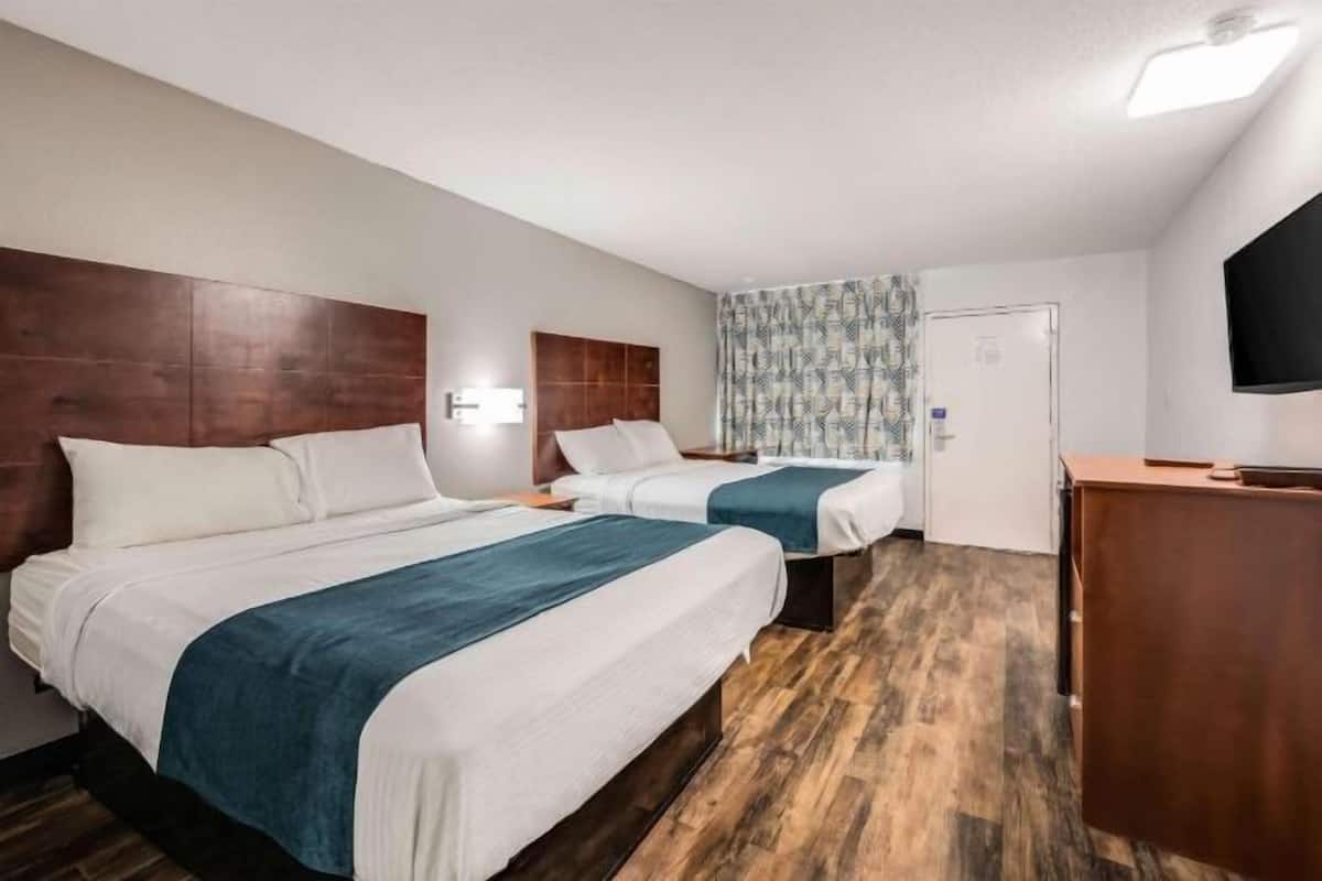 Desk, WiFi (free), alarm clocks, individually furnished