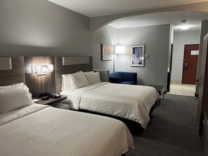 A hotel room with two beds, a desk with a telephone, and a chair. - Holiday Inn Express & Suites Woodward by IHG (Woodward)