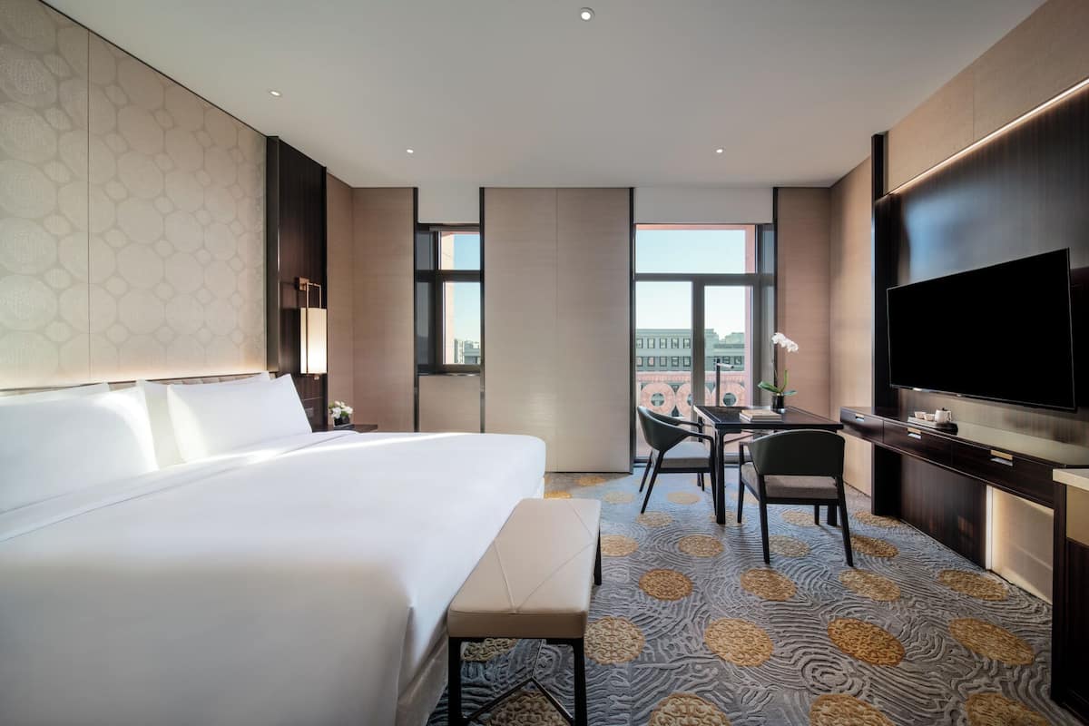 Premium bedding, down duvets, Select Comfort beds, minibar