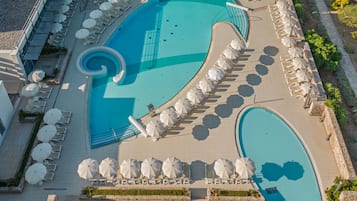 Indoor pool, outdoor pool, pool umbrellas, pool loungers