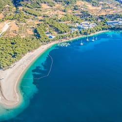 Beach nearby, white sand, beach volleyball