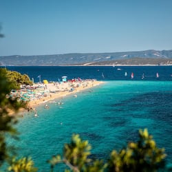 Beach nearby, white sand, beach volleyball