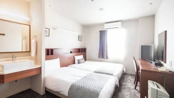 Down comforters, desk, laptop workspace, blackout drapes