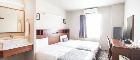 Down duvets, desk, laptop workspace, blackout curtains