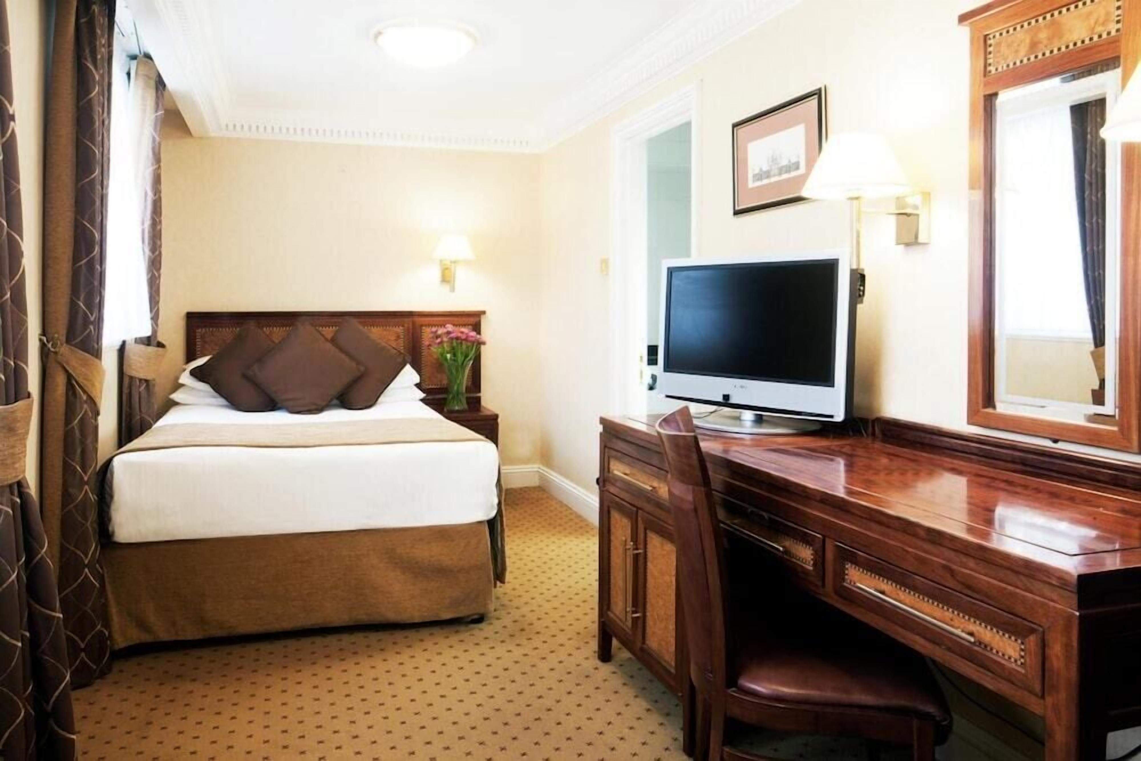 Premium bedding, desk, blackout drapes, iron/ironing board