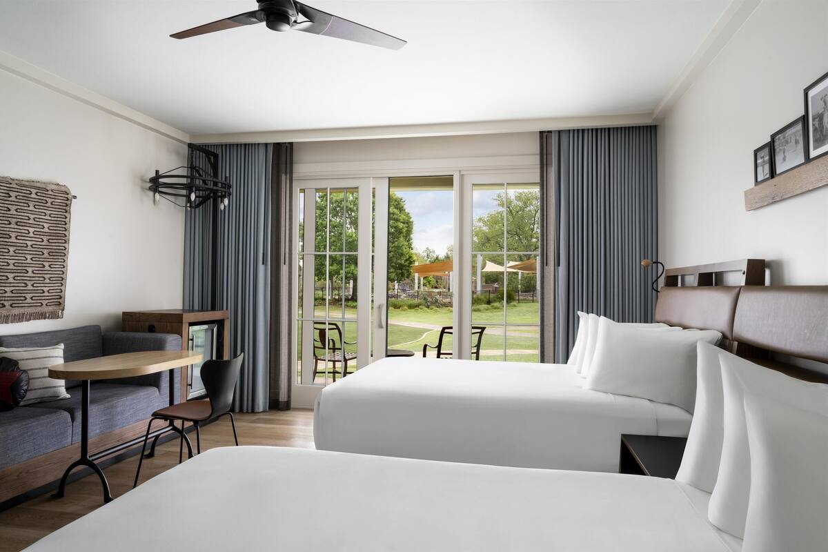 room, 2 queen beds (water view) | hypo-allergenic bedding, down duvets, pillow-top beds, in-room safe