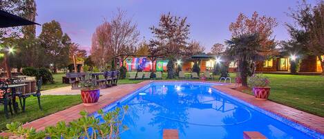 Outdoor pool, pool umbrellas, sun loungers