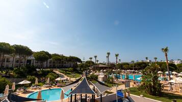 Indoor pool, 2 outdoor pools, open 11:00 AM to 7:00 PM, pool umbrellas